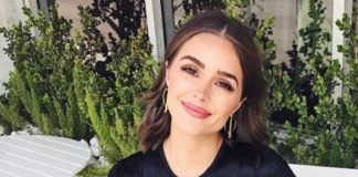 Fashion infographic : Fashion infographic : Fashion infographic : Who made Olivia Culpo’s black fringe sweater and blue skinny jeans?