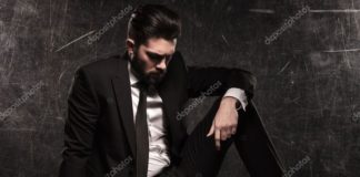 Business infographic : Sad young bearded business man looking down – Stock Photo , #ad, #bearded, #youn…
